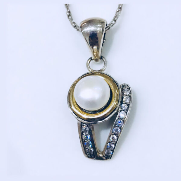 Dije Plata y Oro perla cultivo agua dulce