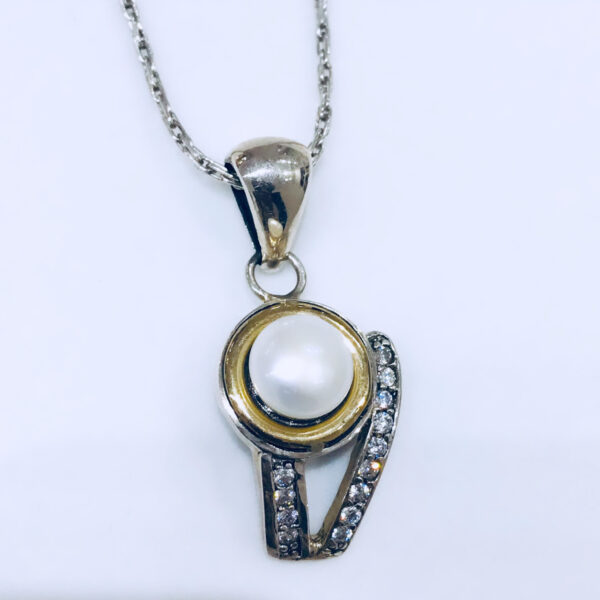 Dije Plata y Oro perla cultivo agua dulce